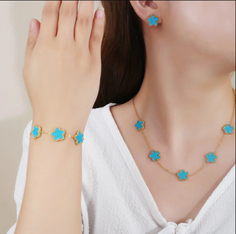 Hot Sale: 3Piece Jewelry Set for Women  Stainless Steel with 18k Gold Plating Featuring Five-Leaf Flower Design Necklace, Earrings, and Bracelet in Clover Style
